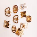 Wholesale New Design Letter Hollowed-Out Metal Turn Locks Custom Brand Letter Logo Push Twist Lock for Bag Accessories
